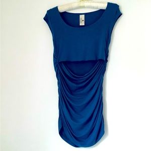 Peek a boo blue maternity top. Size 2